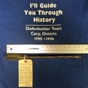 I'll Guide you Through History, blue tshirt and rusted screw driver 18" long