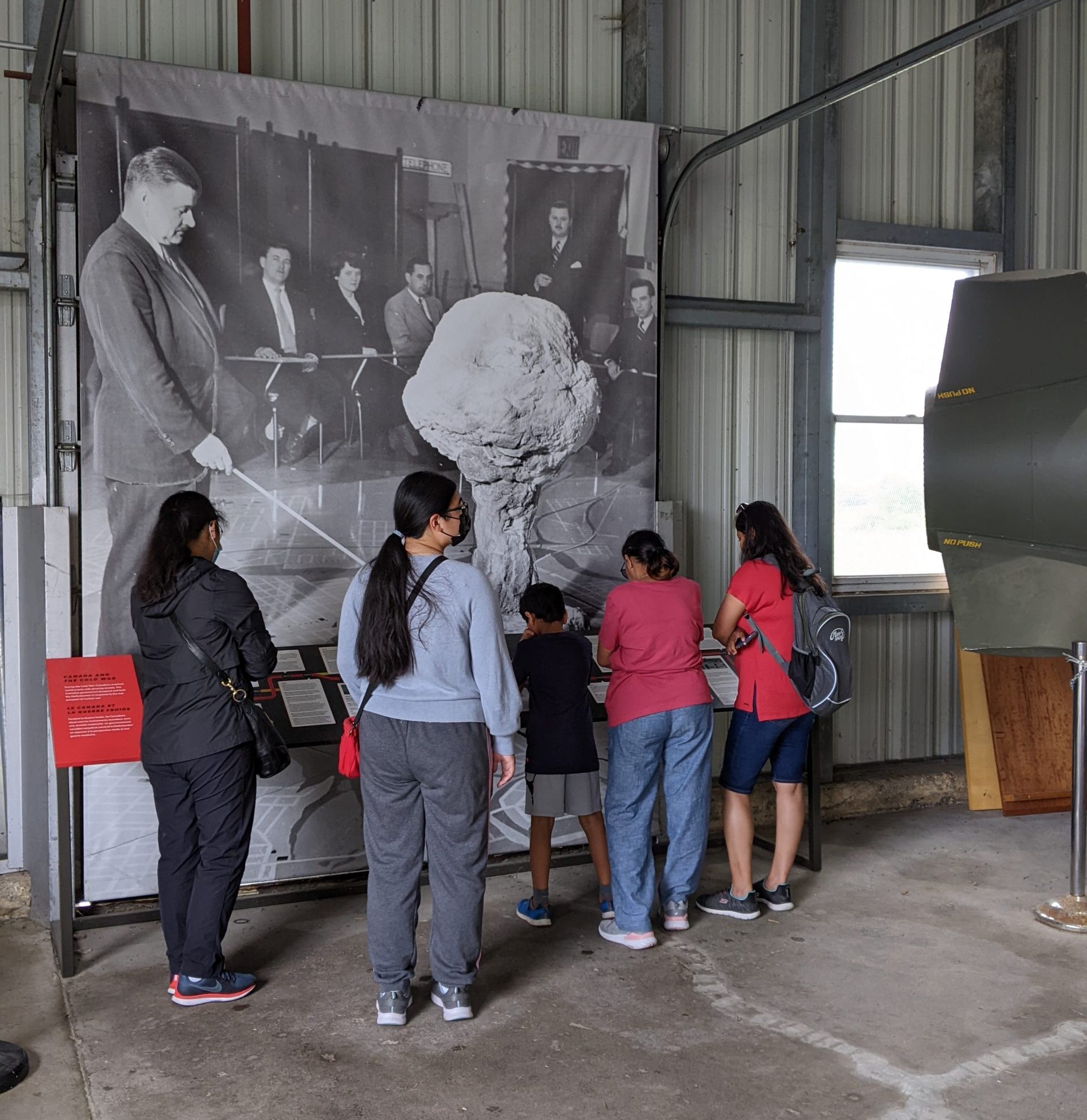 Visitors look at a Cold War display in the entrance to the Diefenbunker.