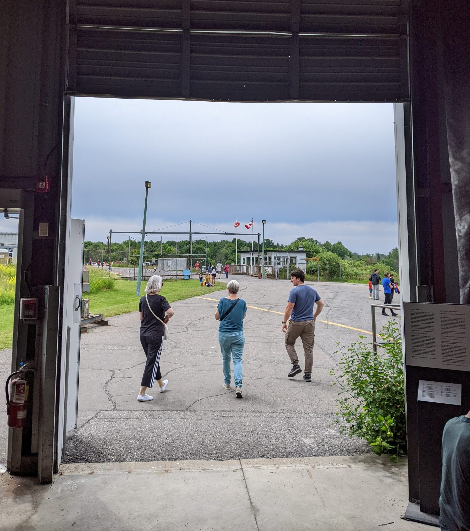 Visitors walk through the large garage door entrance to the Diefenbunker.
