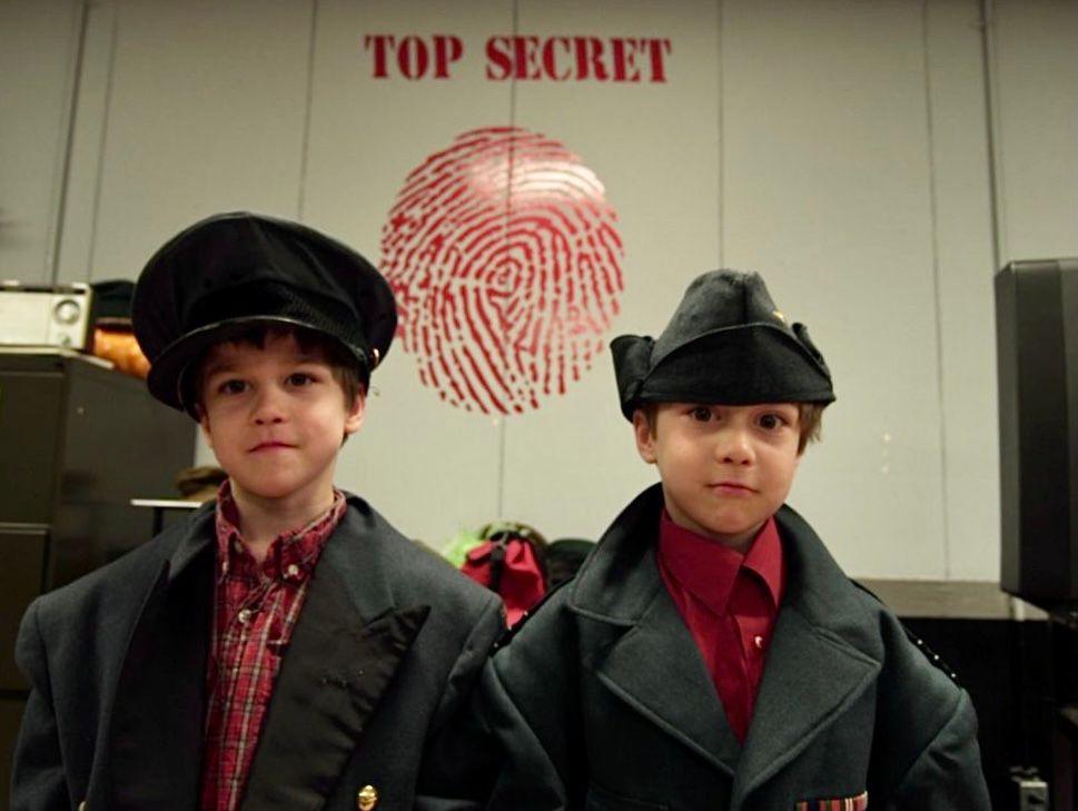 Children dress in detective gear while attending the Diefenbunker's Spy Camp. 