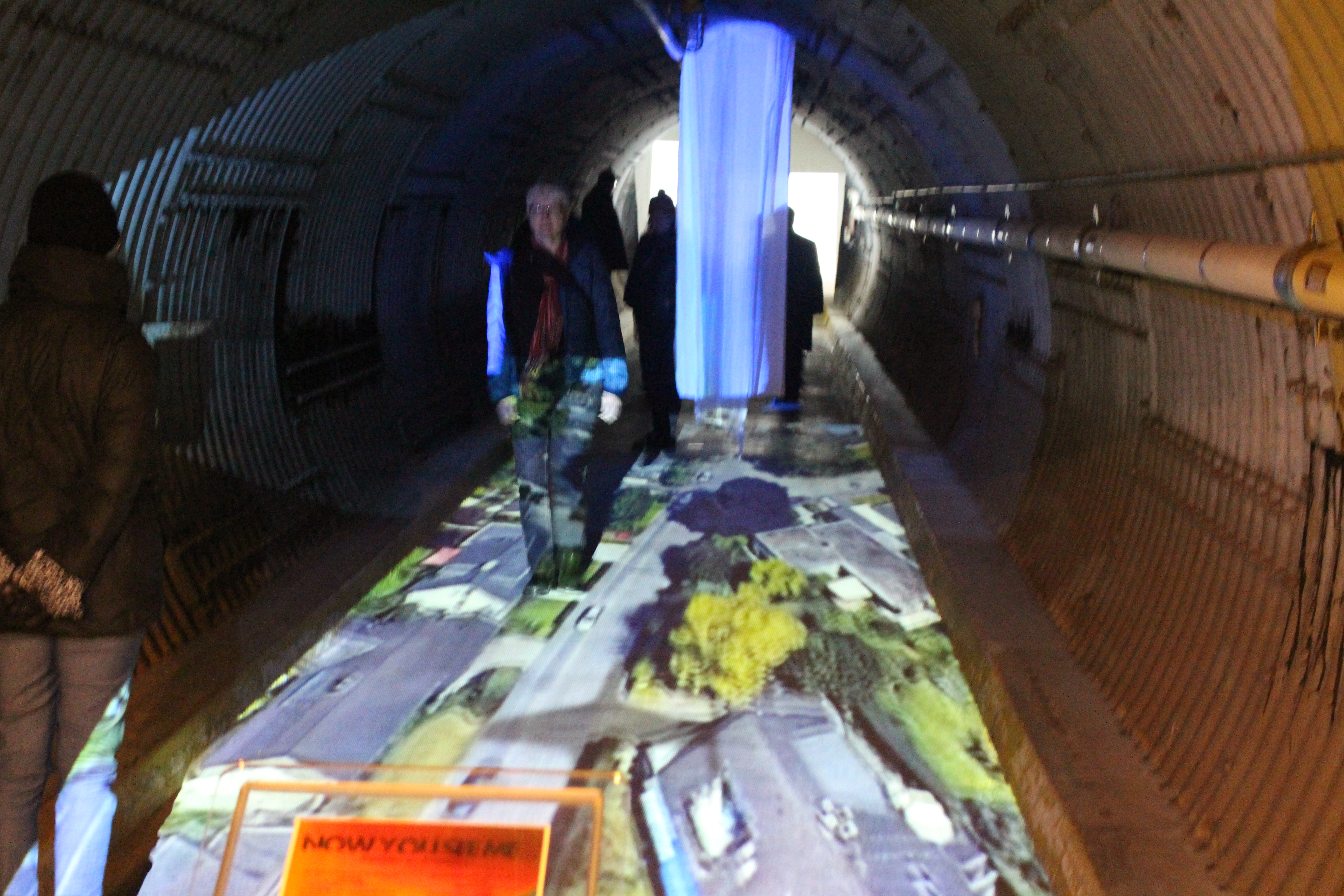 2018 Artist-in-Residence Annette Hegel's installation in the Blast Tunnel with visitors experiencing it.  