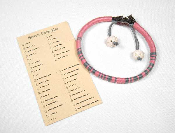 Wrapped leather secret code bracelet