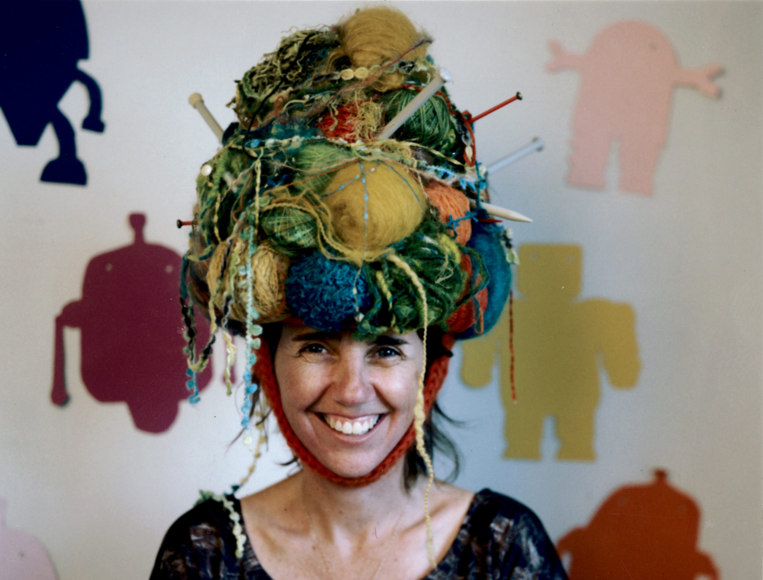 Greta Grip, artist, wearing her art as a hat