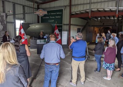 Media and guests at the funding announcement inside the entrance to the Diefenbunker.
