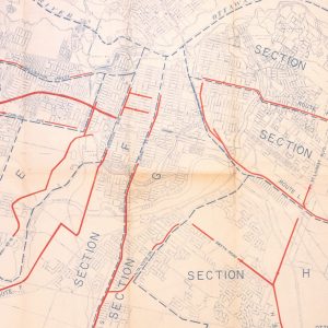 Red and blue lines scattered throughout the Emergency Measures Organization map that indicate the evacuation routes in Ottawa during the Cold War.