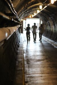 Visitors walk down the Diefenbunker's Blast Tunnel.