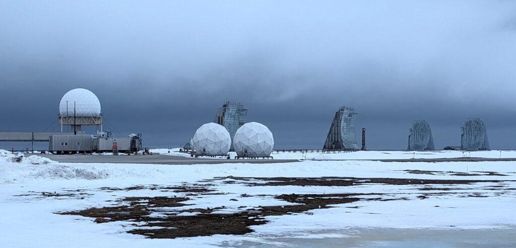 Radar equipment along the horizon at the FOX-Main DEW Line site.