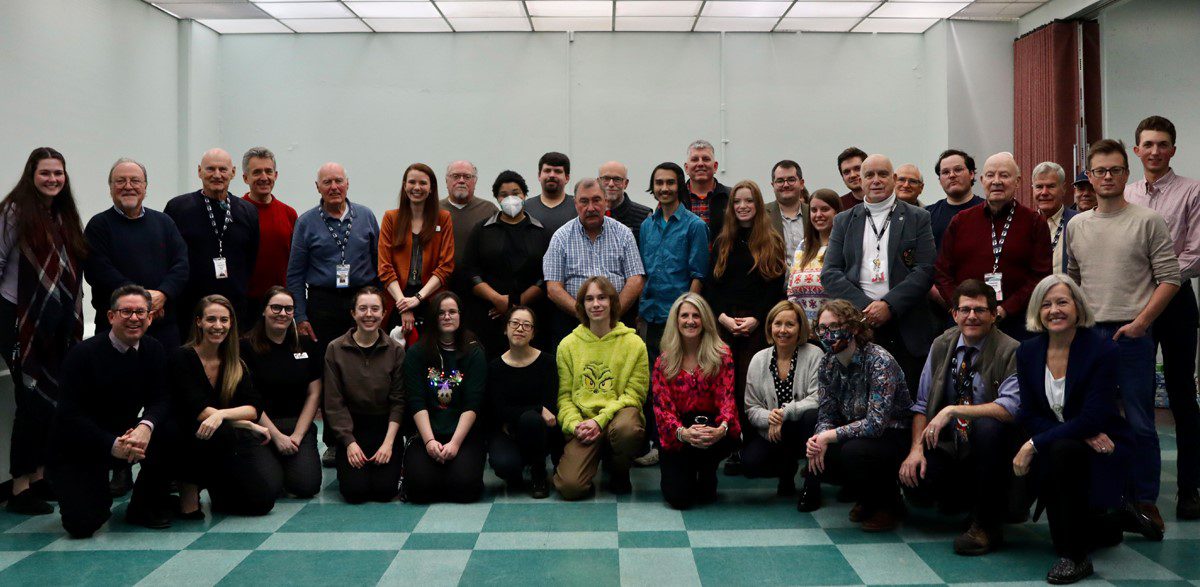 Diefenbunker staff, board, and volunteers gather at a holiday celebration.