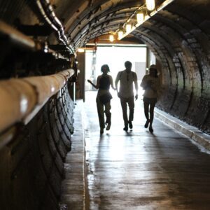 Visitors walk down the Blast Tunnel.