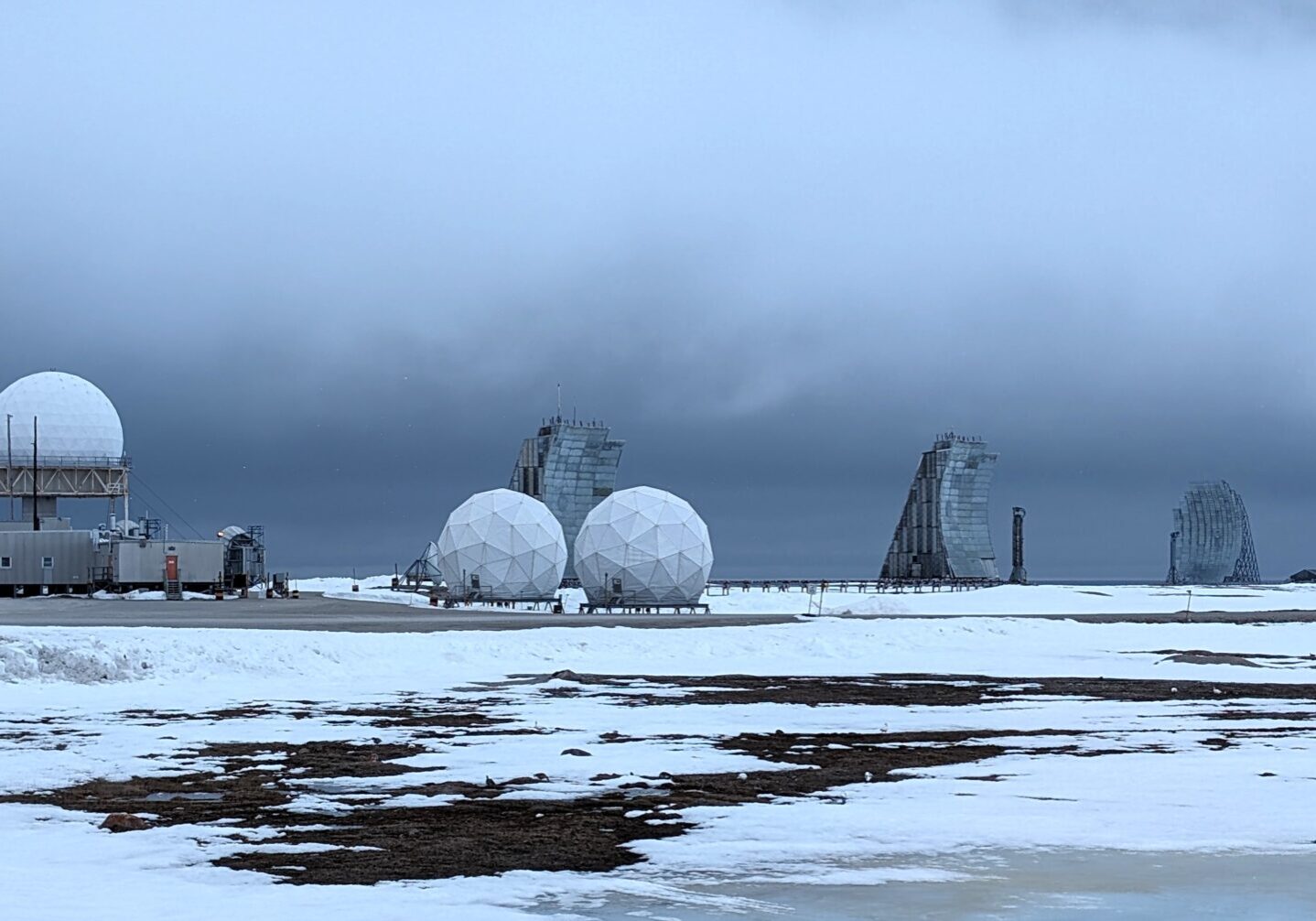 Radar equipment along the horizon at the FOX-Main DEW Line site.