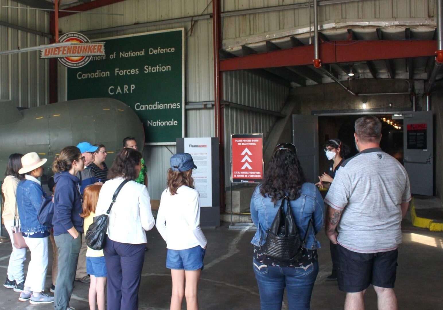 Visitors on a guided tour inside the entrance to the Diefenbunker, formerly CFS Carp.