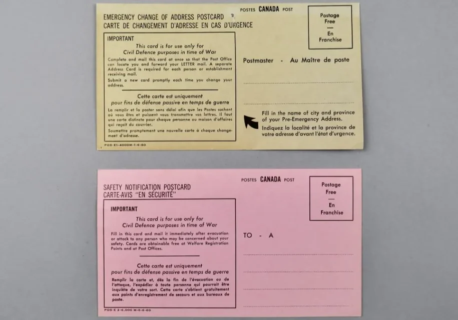 Two different colored envelopes with instructions for writing on them.